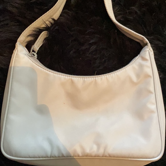 Only used once. I have the boxes to with. Prada - Picture 2 of 5